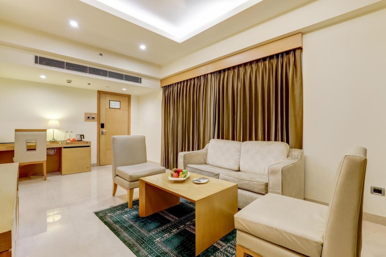 Lemon Tree Premier, Delhi Airport Hotel Ню Делхи Екстериор снимка A suite at the hotel